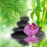 spa Background - black stones and bamboo on water